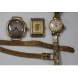 A gold cushion shape cased lady's wristwatch, the case back detailed 'K18' and numbered '371633', an