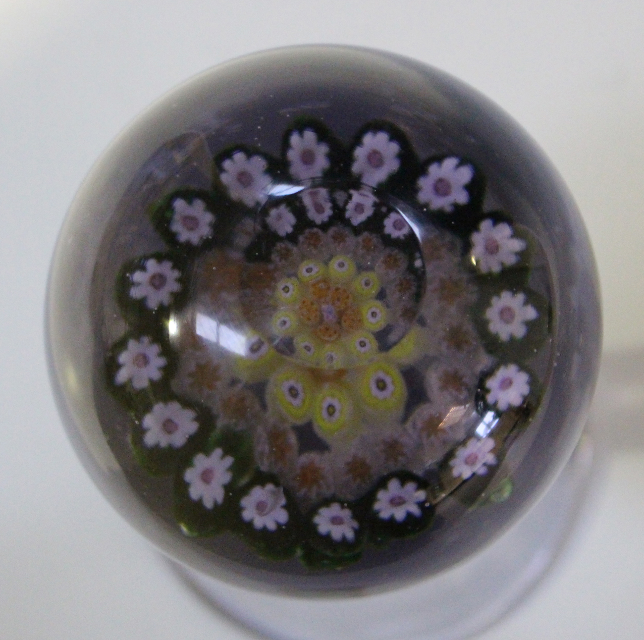 A purple tinted glass paperweight wig stand, late 19th/early 20th century, the spherical ball - Image 2 of 2