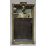 A late George III giltwood and gesso framed pier mirror, the flowerhead surmount above an egg and