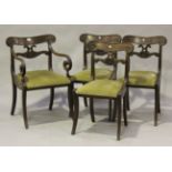 A set of four Regency mahogany bar back dining chairs, comprising a carver and three standards,