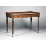 A Regency mahogany side table by Gillows of Lancaster, the galleried back above three drawers,