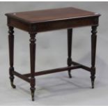 A mid-Victorian mahogany centre table, the moulded top above a frieze carved with flowerheads,