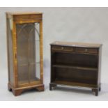 A 20th century reproduction yew narrow display cabinet, height 121cm, width 49cm, depth 32cm,