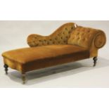 A mid-Victorian scroll end chaise-longue, upholstered in dark orange velour, raised on turned legs