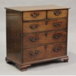 An early George III mahogany chest of two short and three graduated long drawers, on ogee bracket