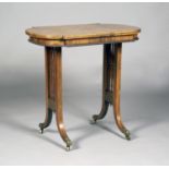 A Regency rosewood shaped centre table with inlaid brass line borders and foliate sprays, the frieze