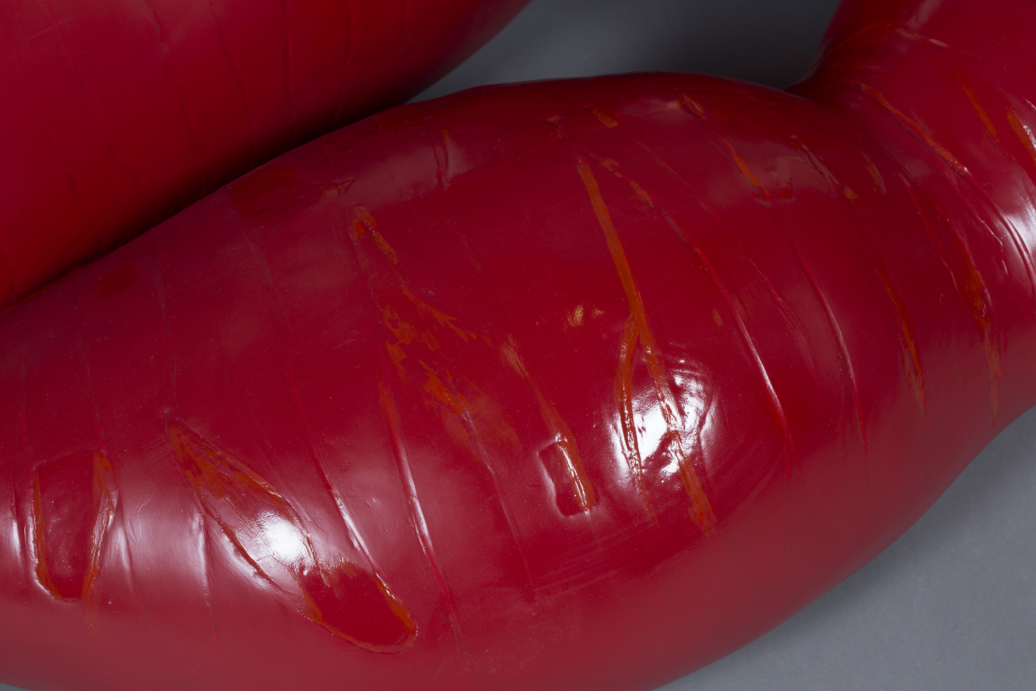 A Louis Durot red polyurethane and foam 'L'échauffeuse' sofa sculpture, moulded in the form of a - Image 2 of 3