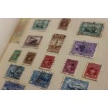 A collection of stamps in six albums and some loose in packets, including British Commonwealth