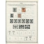 An Ideal stamp album containing world stamps, including China 1878 3 Candarins used, 1897 2c red