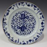 A Chinese blue and white export porcelain circular dish, Kangxi period, the centre painted with