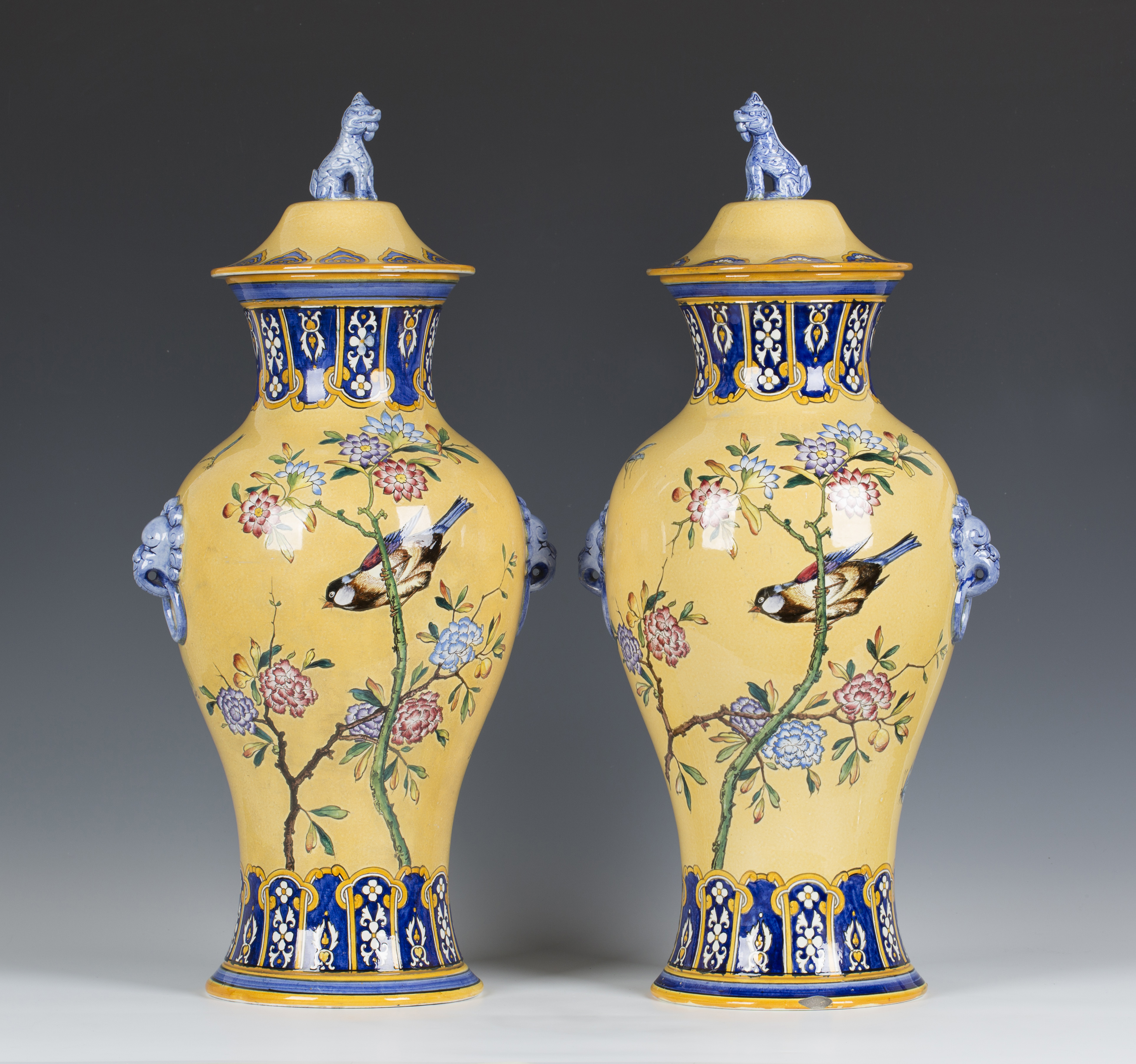 A large pair of Gien pottery yellow ground vases and covers, last quarter 19th century, the baluster