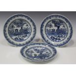 A set of three Chinese blue and white export porcelain circular dishes, Qianlong period, each