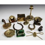 A group of mainly late 19th century equestrian related collectors' items, including a patinated