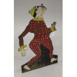 A late 19th/early 20th century French tole painted plate metal stick stand in the form of a clown,