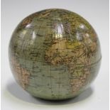 An early 20th century novelty money box in the form of a terrestrial globe, bearing maker's mark '