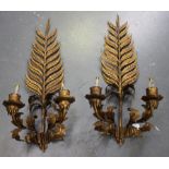 A pair of early/mid-20th century French tole painted wrought metal twin light wall sconces with fern