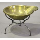 A late 19th century French brass basin with pouring lip, raised on a polished steel stand, height