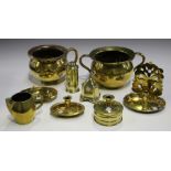 A small group of mainly 18th century brassware, including a small shaving bowl, width 19cm, a