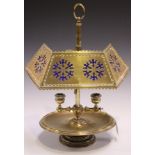 A mid-19th century brass desk lamp, the pierced adjustable shade inset with blue glass above a