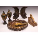 A group of various treen items, including a pair of early 20th century pokerwork vases and covers,
