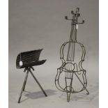 A late 20th century wrought iron novelty floor standing candelabrum in the form of a cello, height