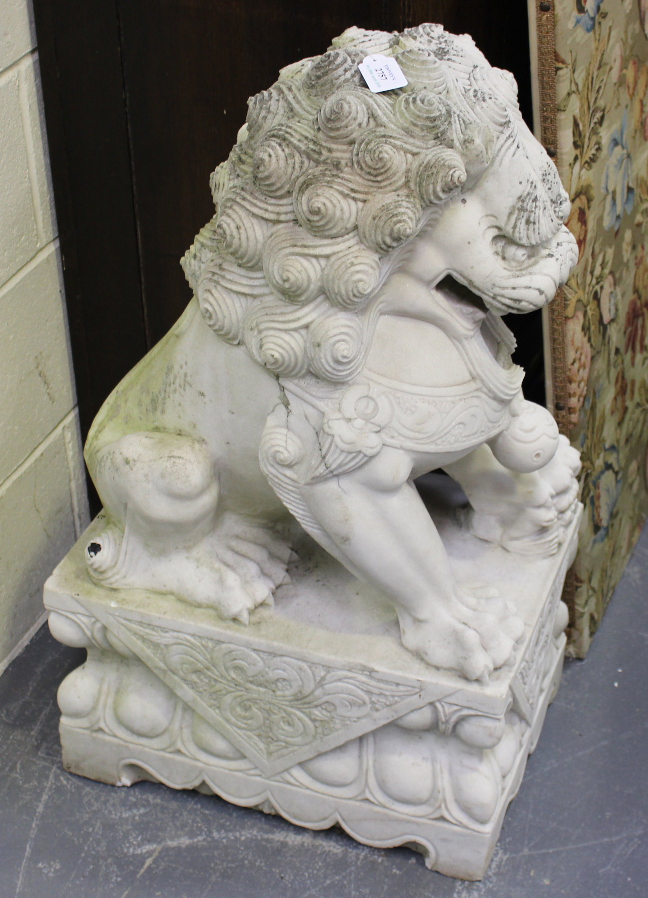 A pair of late 20th century Chinese reconstituted white marble garden models of temple dogs,