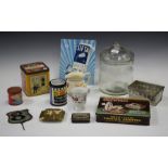 A collection of advertising collectors' items, including a Smith's Crisps glass jar and cover,