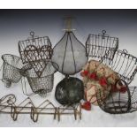A group of mainly early 20th century French wirework items, including a wall mounted onion bag,