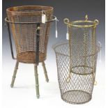 A late 19th century French polished brass and mesh cylindrical stand on scroll supports, height