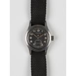 A Vertex MoD issue steel backed gentleman's wristwatch, the signed black dial with arrow, luminous