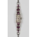 A Cyma platinum, diamond, ruby and synthetic ruby rectangular cased lady's dress wristwatch, the