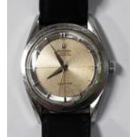 A Universal Polerouter Microtor steel cased gentleman's wristwatch, the signed silvered dial with