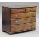 An early 19th century mahogany bowfront chest of two short and three long drawers, on bracket