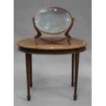 An Edwardian mahogany oval occasional table, on square tapering legs with spade feet, width 91cm,