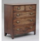 A George III mahogany chest of two short and three long drawers, the crossbanded top with boxwood