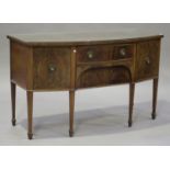 An early 20th century George III style mahogany bowfront sideboard, on square tapering legs,