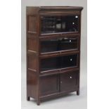 A 20th century Globe Wernicke style mahogany sectional bookcase, fitted with three glazed doors