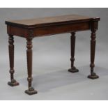 An early Victorian mahogany serving table, the inverted breakfront top above a single drawer, raised