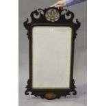 A late 19th century mahogany fretwork framed wall mirror with shell inlaid decoration, 107cm x