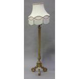 An early 20th century giltwood and gesso lamp standard with reeded sconce and tapering stop fluted