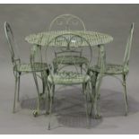 A mid-20th century green painted wrought metal garden table, height 76cm, diameter 99cm, together