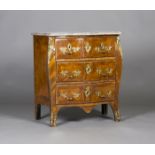 A small Louis XV kingwood bombé commode with applied gilt metal leaf scroll mounts, handles and