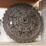 A large pair of late Victorian cast iron ceiling roses of pierced acanthus leaf, berry and