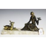 A mid-20th century Art Deco style gilt and brown patinated cast spelter figure group of a lady