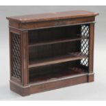 A late 20th century hardwood bookcase, the sides with pierced inset panels, on a plinth base, height