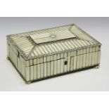 A 19th century Anglo-Indian ivory and sandalwood workbox, the exterior with engraved borders, the