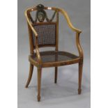 An Edwardian Neoclassical Revival satinwood tub back salon armchair, the painted ribbon, portrait