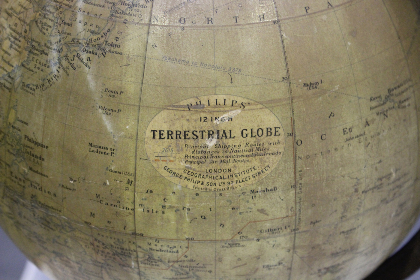 An early 20th century 'Philips' 12 inch Terrestrial Globe', raised on a cast iron foliate base - Image 2 of 2