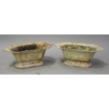 A pair of late 19th century white painted cast iron planters of flared rectangular form, width