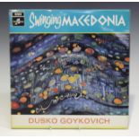 A stereo first pressing of the LP record 'Swinging Macedonia' by Dusko Goykovich, on the Columbia